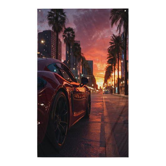 Visuel de drapeau gaming style GTA d'une voiture de luxe rouge sous un ciel de soleil couchant, avec des bâtiments et des palmiers en arrière-plan, évoquant une ambiance stylée et urbaine.